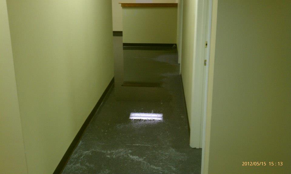 Water damage restoration — flooded commercial hallway in Central Florida